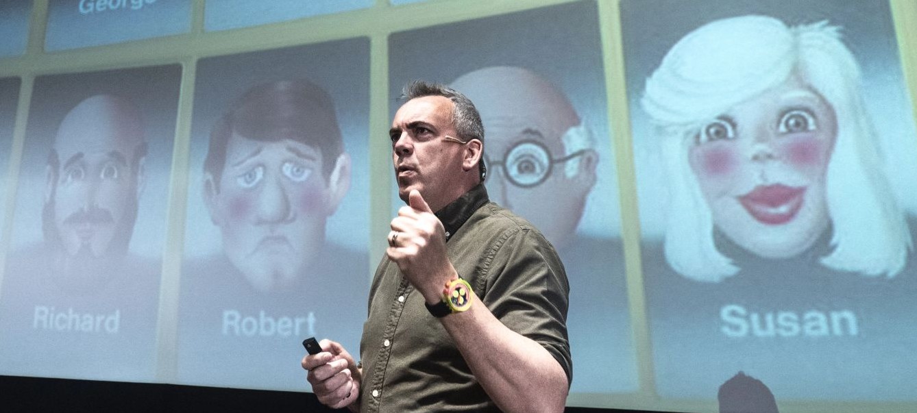 Steve Kemish on stage delivering a keynote